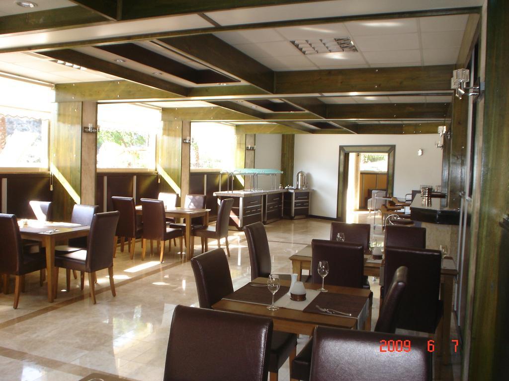 فندق فندق داليان تيزكان المطعم الصورة